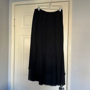 Fully lined long skirt. Elegant & chic Tailored to hug your curves. 100% polyest